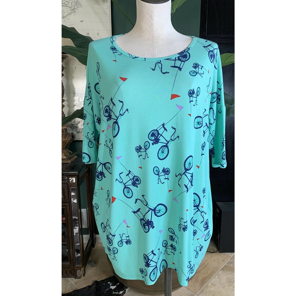 lularoe Women’s medium aqua bicycle print short sleeve tunic top X